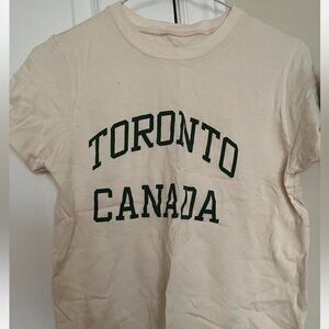 Brandy Melville Cream John Galt T-Shirt